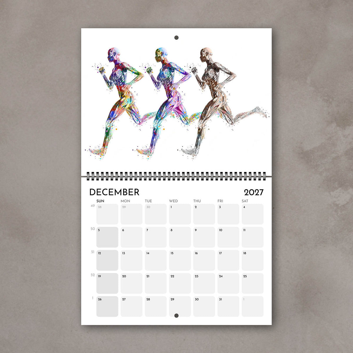2027 anatomy wall calendar December page with running body muscles artwork, sports watercolor decor