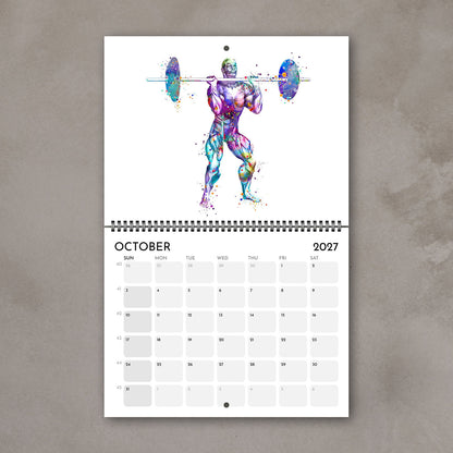 2027 sports anatomy wall calendar October page featuring weightlifting muscle watercolor artwork