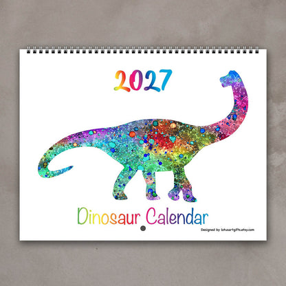Cover of the 2027 kids’ dinosaur wall calendar with a multicolor watercolor prehistoric animal illustration