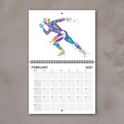 2027 anatomy wall calendar February spreads featuring human body muscles, medical artwork of sports running