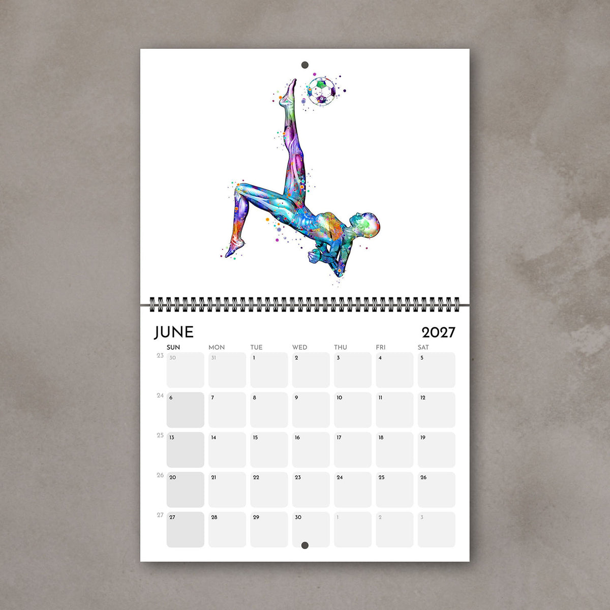 2027 anatomy wall art calendar June page featuring human body muscles in female soccer, sports medical science art