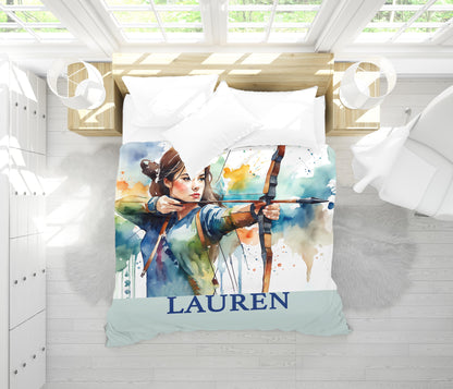 Archery girl watercolor comforter folded - archer gift on white table with custom name