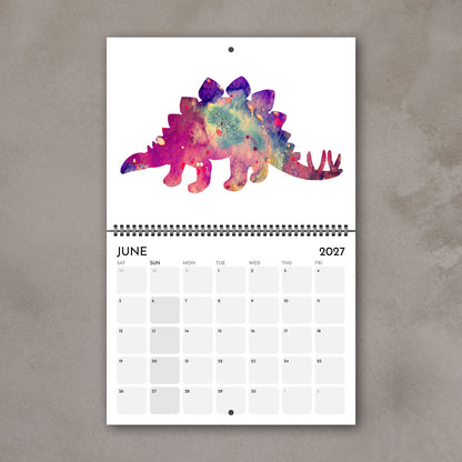June 2027 dinosaur wall calendar page with a colorful watercolor illustration of a prehistoric animal