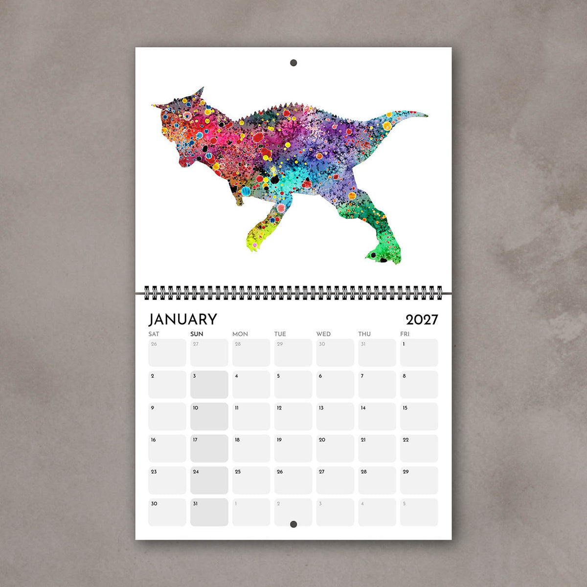 January 2027 wall calendar page with colorful watercolor dinosaur art above the monthly dates