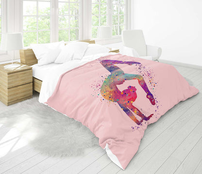 Girl gymnast comforter on twin bed, watercolor tumbling art pink sports bedding for gymnasts