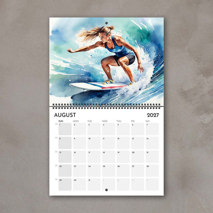 2027 Girls sports watercolor wall art calendar August page with surfing girl artwork in vivid blue and turquoise tones