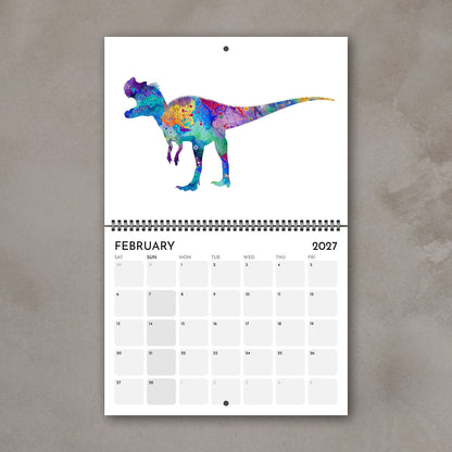 February 2027 kids’ calendar page with a blue and purple watercolor dinosaur