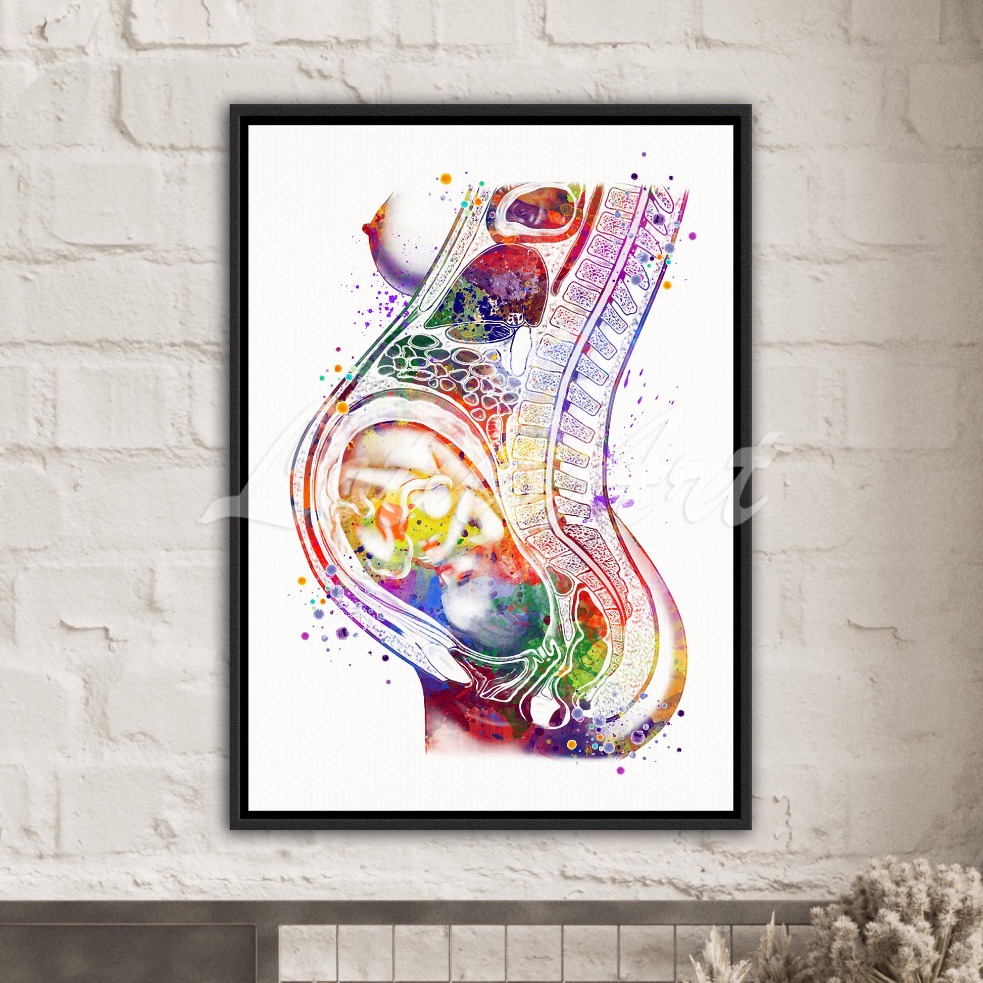 Framed canvas art print of a detailed watercolor painting showing a baby in the womb during pregnancy in multi-color.