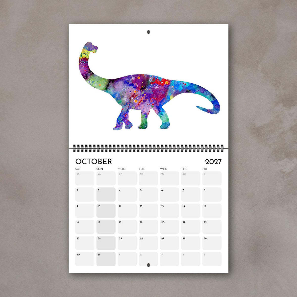 October 2027 dinosaur kids’ wall calendar page with a purple and blue watercolor illustration