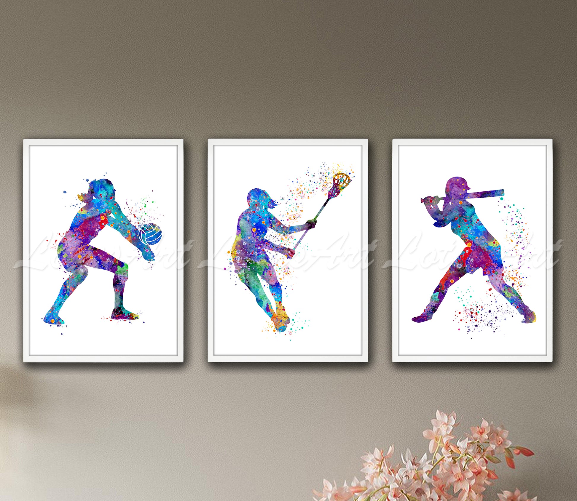 Set of 3 girls sports art prints in multicolor watercolor - volleyball, lacrosse, baseball on wall