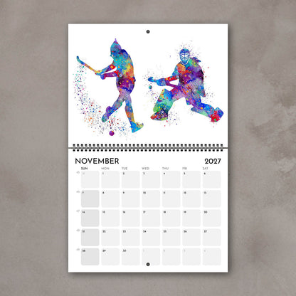 2027 sports watercolor wall calendar November page with field hockey and ice hockey art for girl athletes & girls' room decor