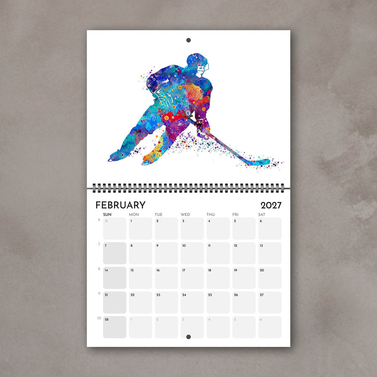 2027 sports watercolor wall calendar February page with ice hockey design, planner for girl athletes and girls' room decor