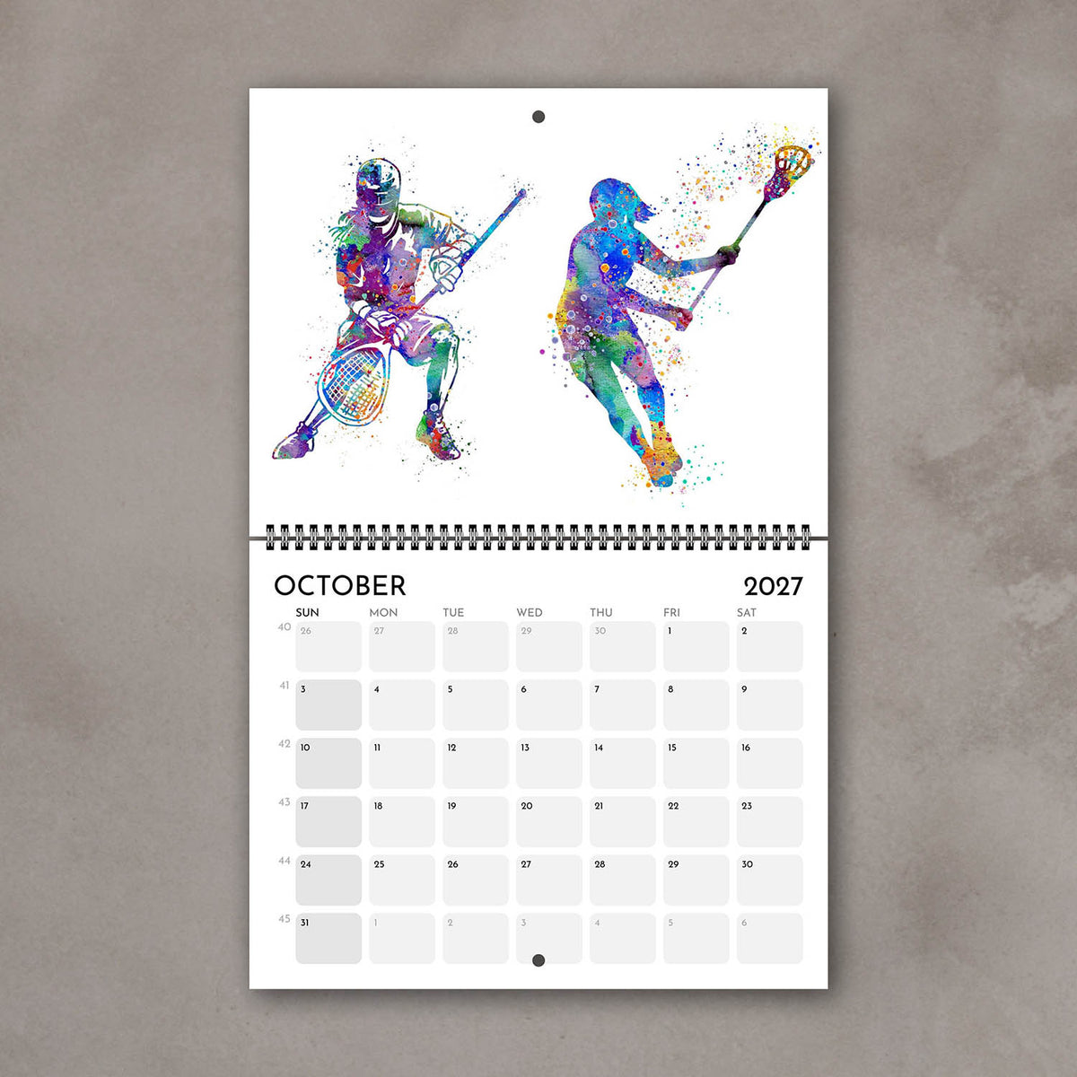 2027 sports watercolor wall calendar October page with lacrosse art for girl athletes and girls' room decor