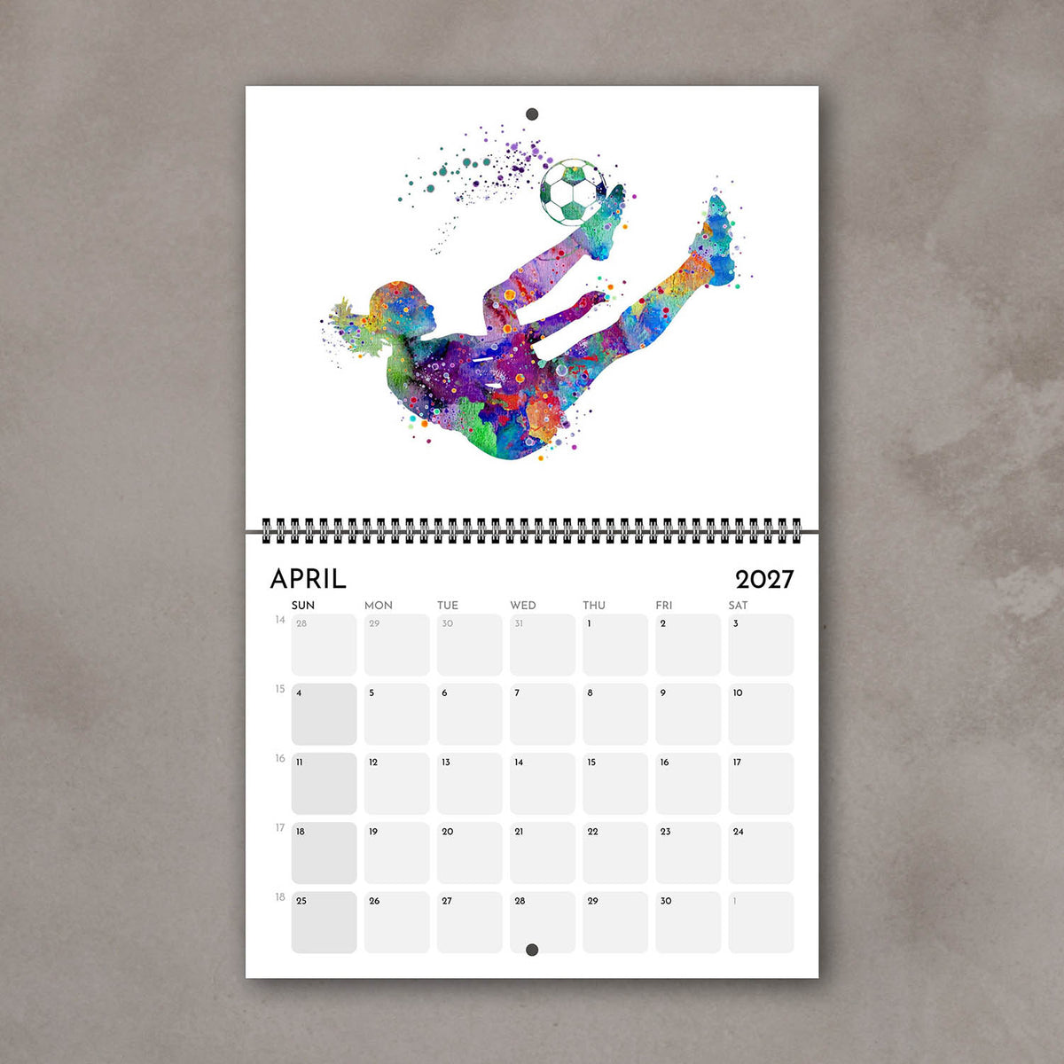 2027 sports watercolor wall calendar April page with soccer design, planner for girl athletes and girls' room decor