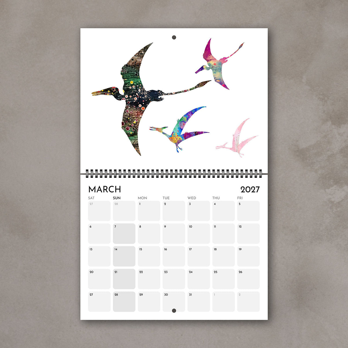 March 2027 kids’ dinosaur calendar page with watercolor illustrations of flying prehistoric animals