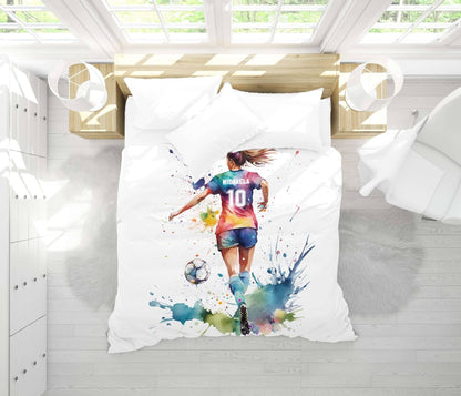 Soccer girl watercolor duvet cover folded - multicolor sports art gift with custom name and jersey number